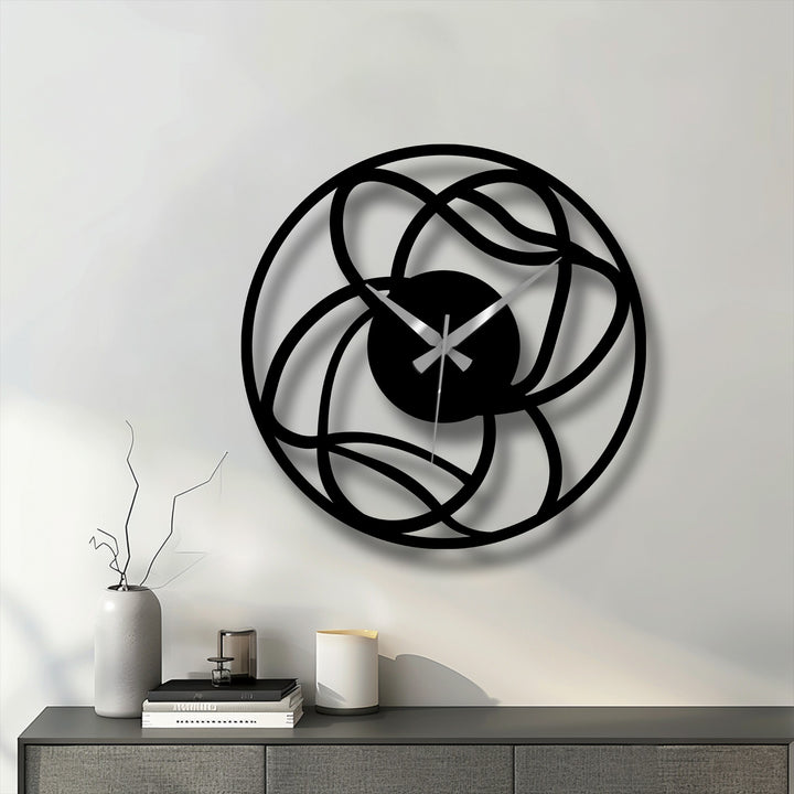 The stillness of the room is accentuated by the modern interwoven abstract geometric decorative clock, a piece of metal art for wall that pauses time in its minimalist form.