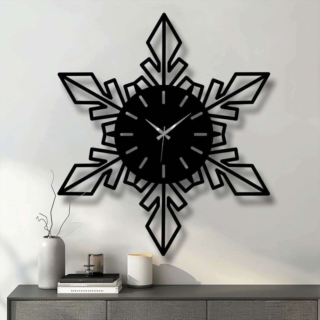Bold black geometric snowflake metal wall clock sharply contrasts against the light background, highlighting its intricate modern decoration wall art design.