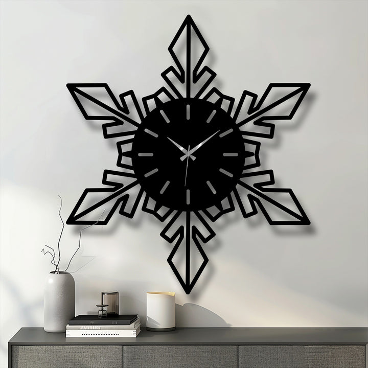 Bold black geometric snowflake metal wall clock sharply contrasts against the light background, highlighting its intricate modern decoration wall art design.