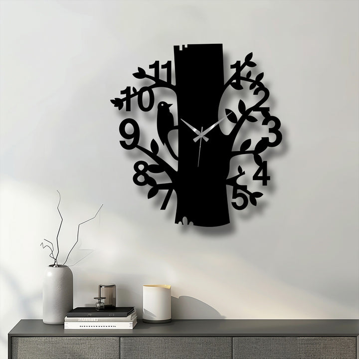 Foreground view of the forest bird metal wall clock showcases a unique decoration wall art piece featuring a nature-inspired tree design.