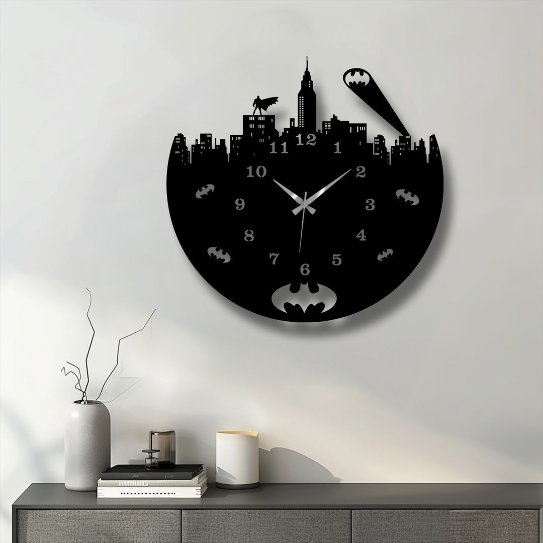 The muted color saturation of this unique metal wall art, an urban night skyline metal wall clock, highlights its dark city hero theme against a light wall.