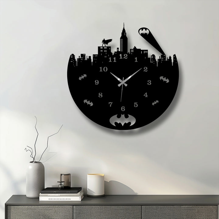 The muted color saturation of this unique metal wall art, an urban night skyline metal wall clock, highlights its dark city hero theme against a light wall.