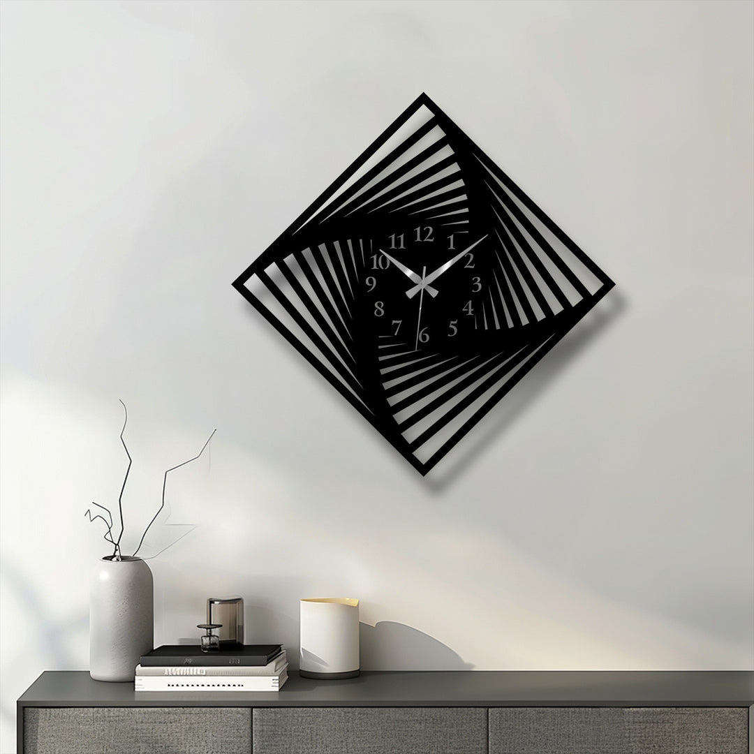 Predominantly light grey and off-white walls highlight the striking black twisted square metal wall decor clock with an optical design.