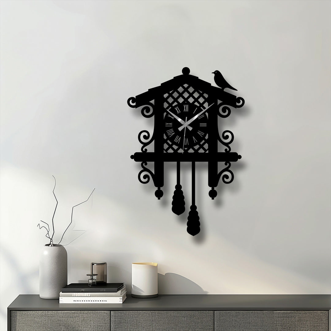 Sharp color contrast defines this classic cuckoo metal wall decor clock, highlighting the vintage bird design against a light backdrop.