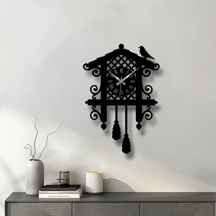 Sharp color contrast defines this classic cuckoo metal wall decor clock, highlighting the vintage bird design against a light backdrop.