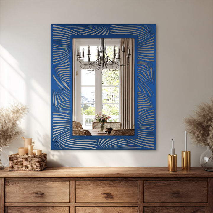 Brightest area highlights the reflective surface of this floor mirror with an abstract wave frame, a modern wall mirrors addition to any room.