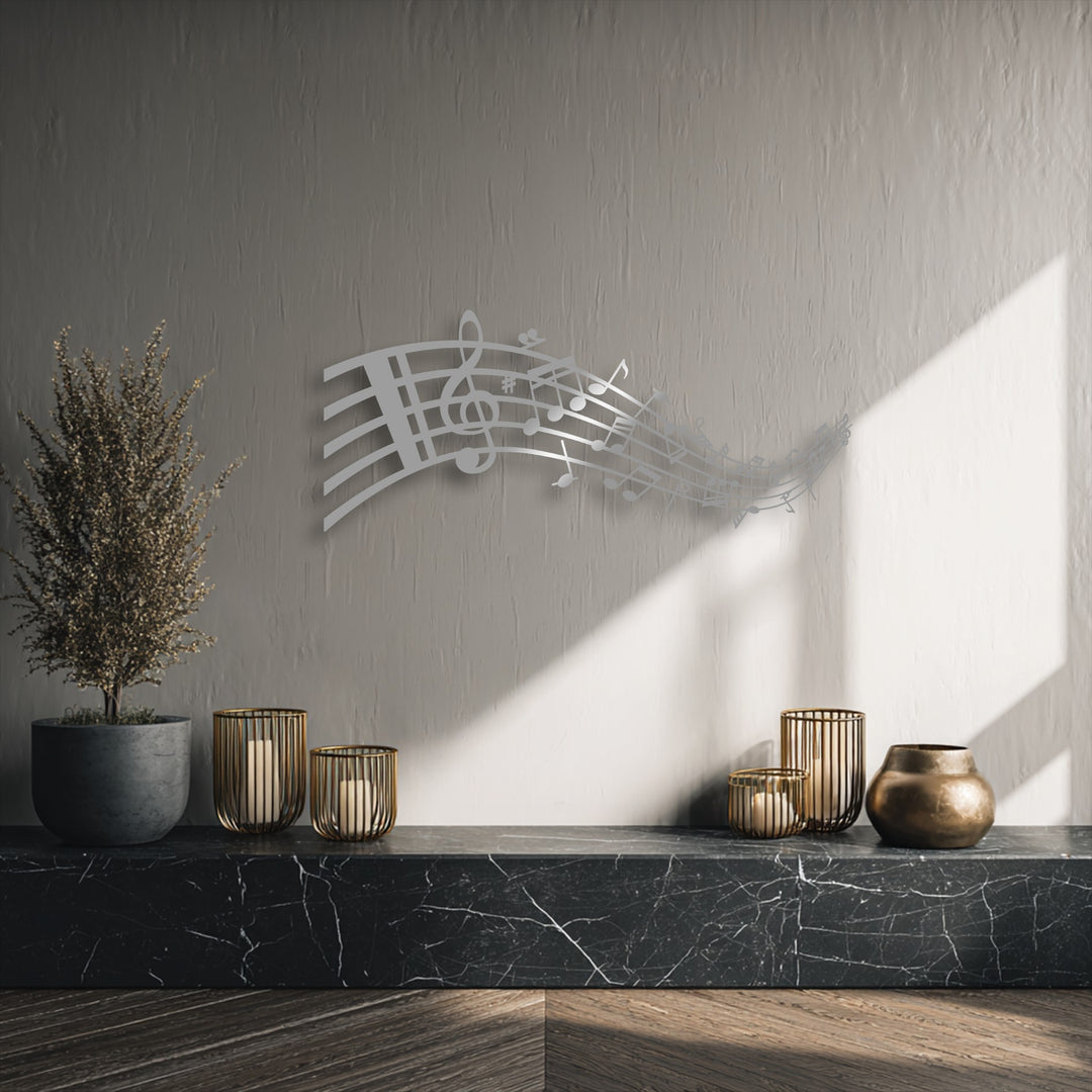 The flowing, silvery musical notes abstractly capture music's essence in this unique metal wall art.