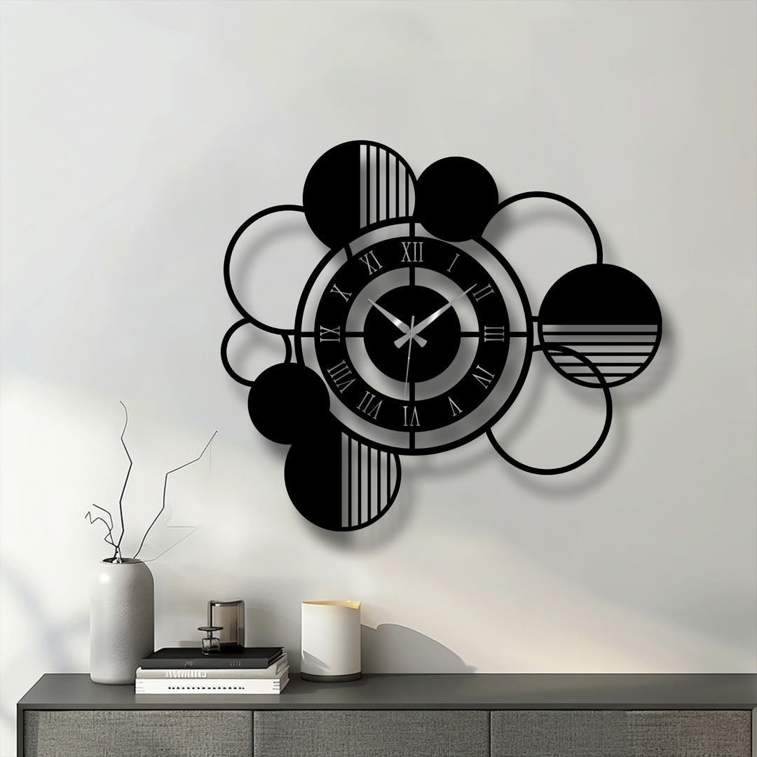 Foreground staging includes a gray sideboard with modern decoration wall art and a gray vase with bare branches, complementing the metal circle clock.