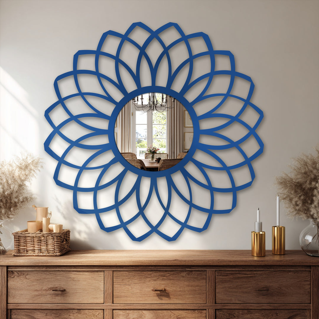 Smooth, cobalt decoration wall art forms a layered petal design around this stylish, modern mirror, adding textural depth to its reflective surface.
