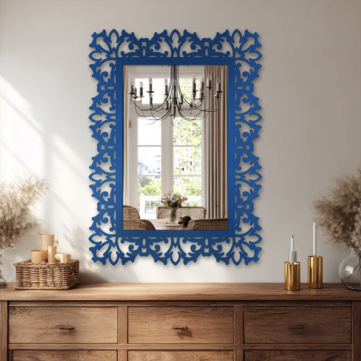 Showcasing the layering effect of the ornate botanical scroll framed mirror that adds depth to the reflection and enhances the decorative metal art.
