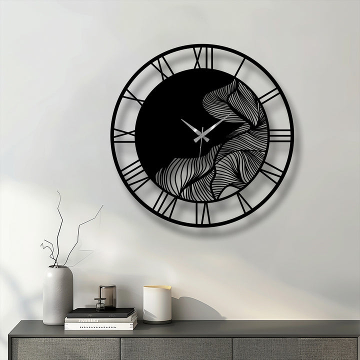 Featuring a sleek black finish, this abstract leaf metal wall clock showcases unique metal wall art with Roman numerals, offering modern botanical decor.
