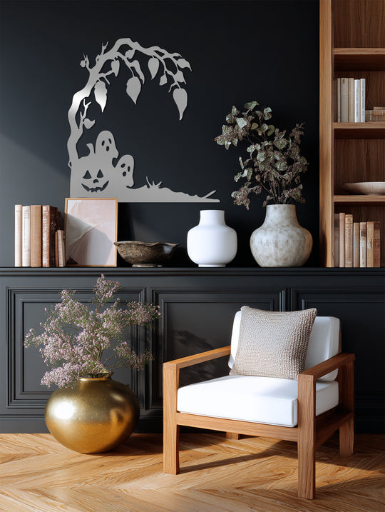 Highlighting the layering effect, the silver decoration wall art presents a spooky Halloween scene with layered pumpkin, ghosts, and bare tree against a dark wall.