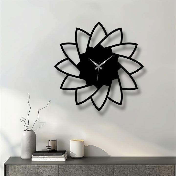 Showcasing the focal point of this lotus bloom metal wall clock, an intriguing piece of metal art for wall displaying a minimal floral design.