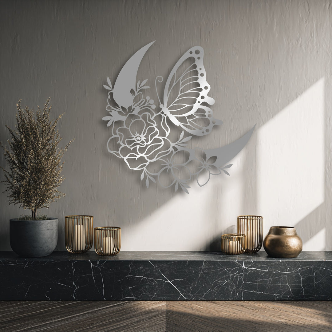 The geometric cutouts of the metallic butterfly and floral crescent moon decorative metal art create an elegant pattern on the textured wall.