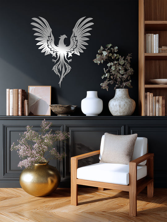 Reflecting light from the metal wall decor, the phoenix image showcases a gradient of silver tones against the charcoal wall.