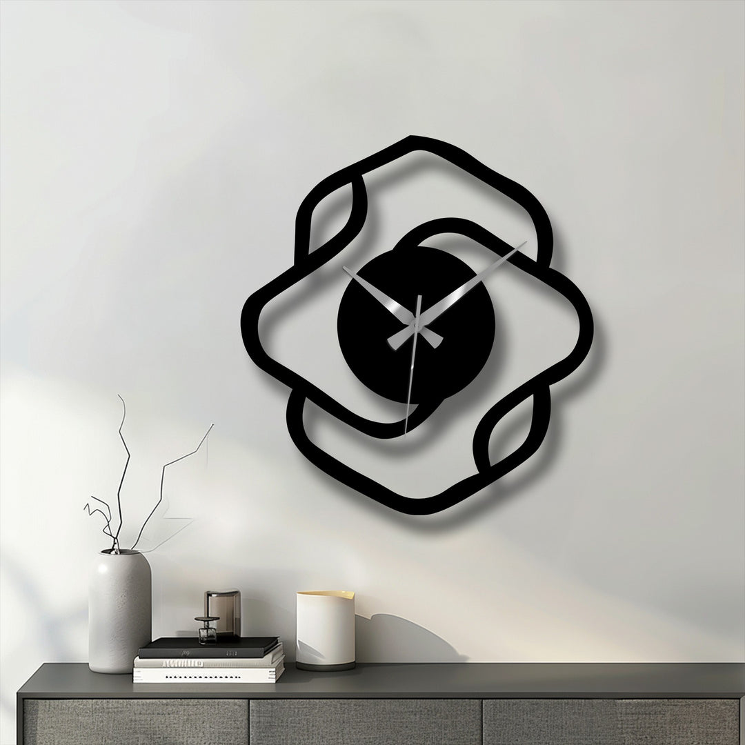 Multiple depths and layers are apparent in this abstract organic shape modern metal art for wall clock, casting shadows and adding dimension to the design.