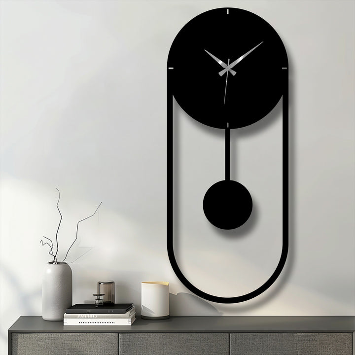 Focusing on the minimalist pendulum, the unique metal wall art features a modern vertical frame that serves as a stylish wall clock, adding an elegant touch to the decor.