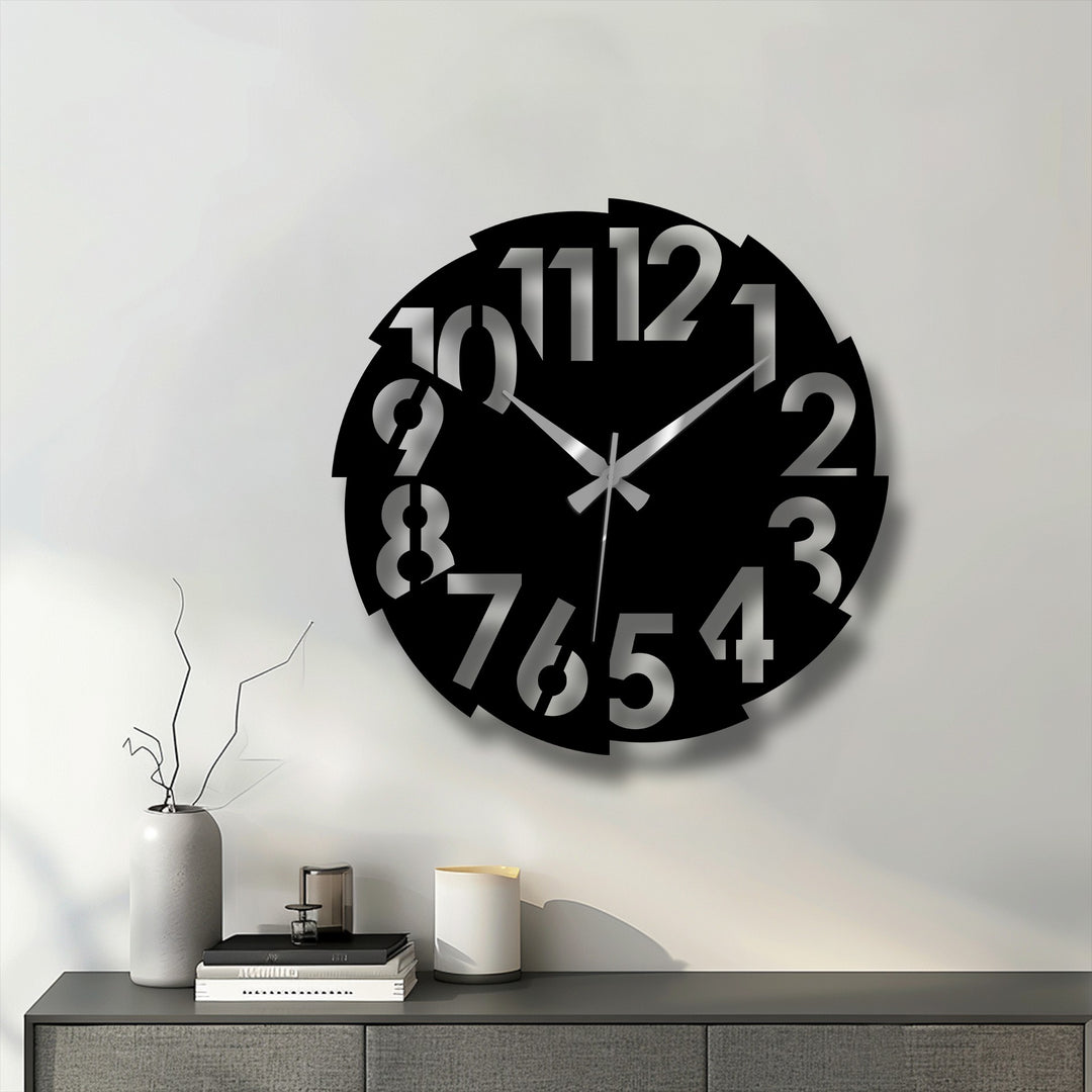 The striking transition between the black base and silver numbers defines this modern split number metal artwork, creating a visually stunning large decorative wall clock.