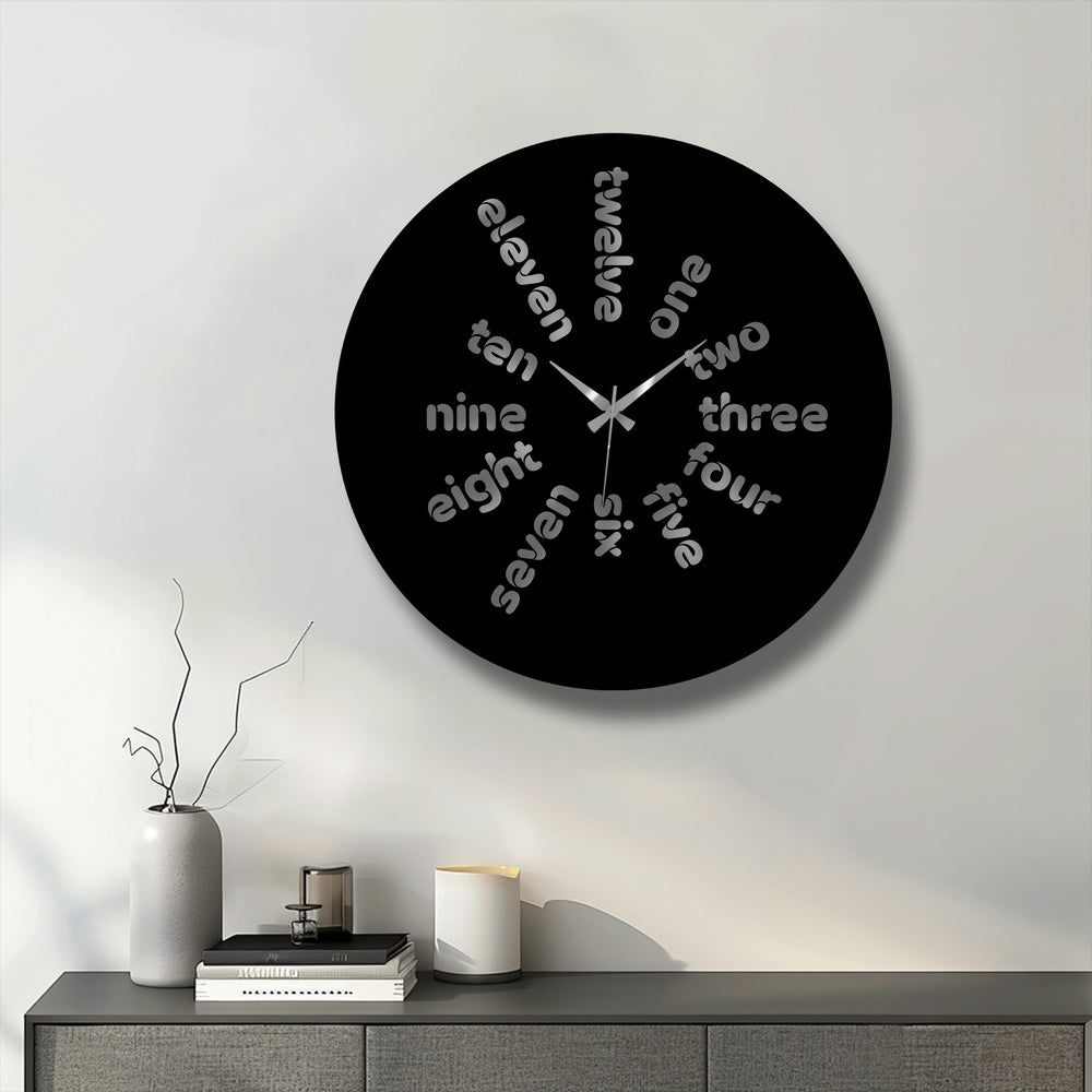 The captivating central subject is a black word time metal art for wall clock, displaying a modern typography design with the hour markers spelled out.