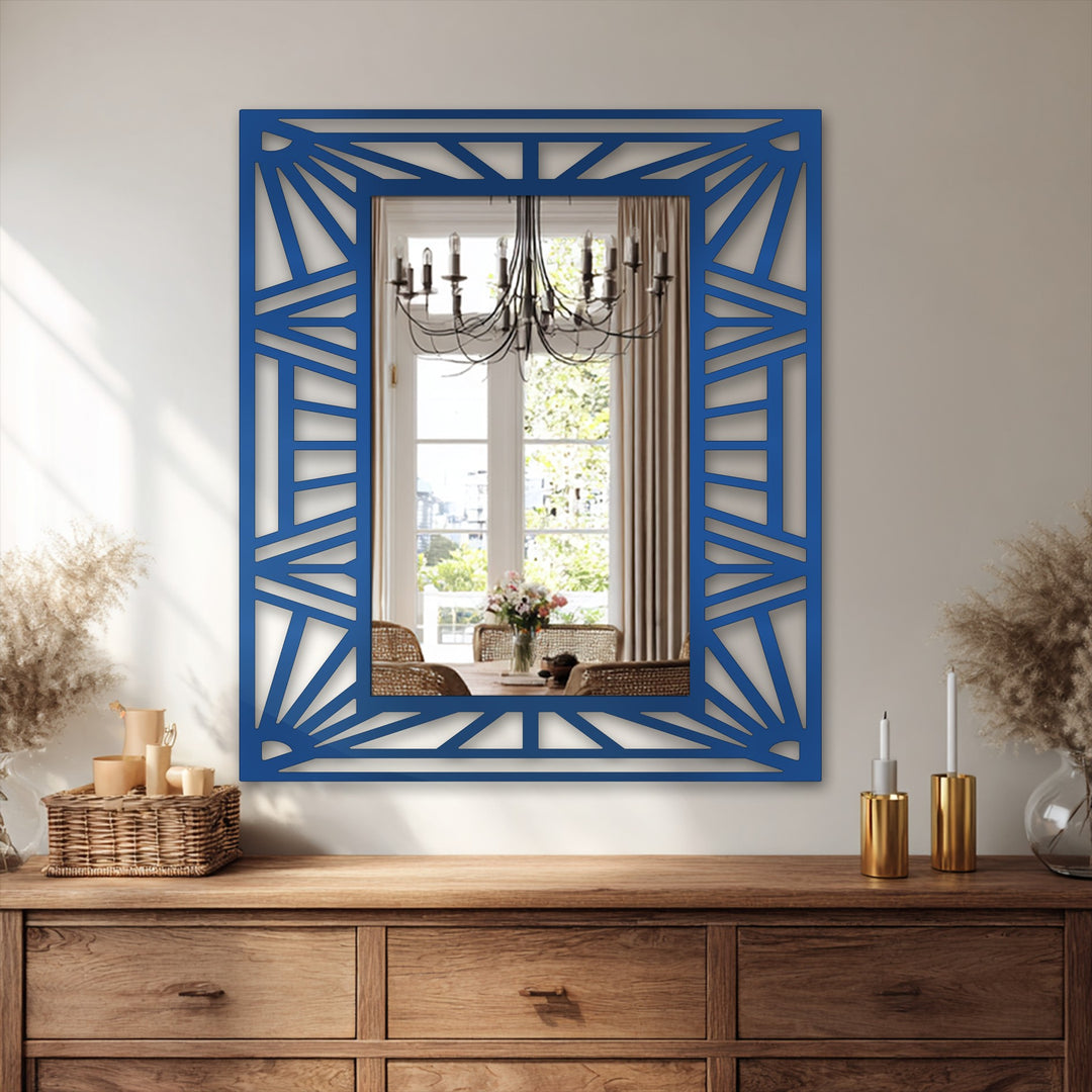Angular geometric shapes create a striking sunburst pattern on this modern wall mirrors framed mirror, adding a decorative edge to the rectangular glass.