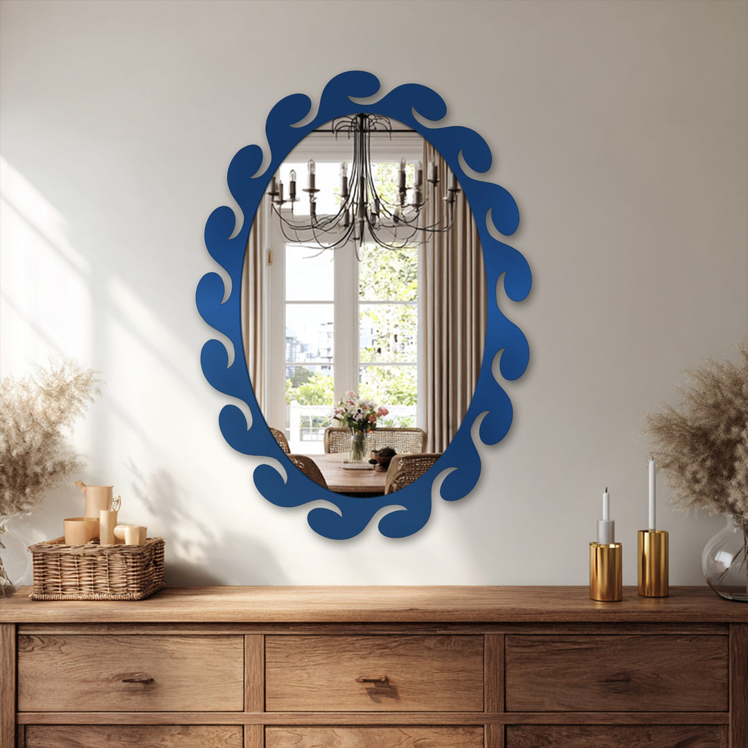 Soft reflections fill the stained glass wall mirror, an oval floor mirror with fluid, gentle wave-like details in its frame.