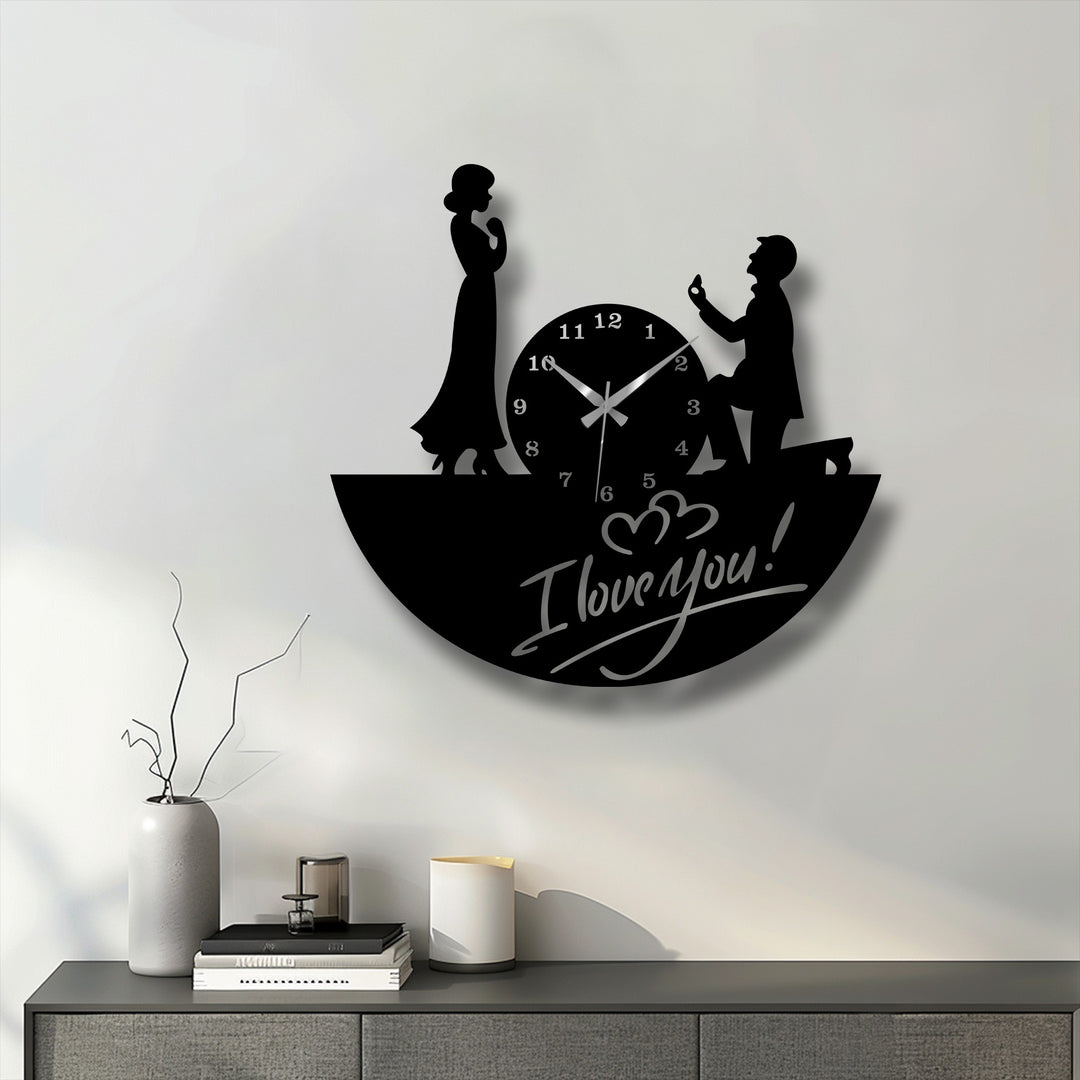 Lit by a soft glow, this image showcases a unique metal wall art clock depicting a romantic love proposal scene.
