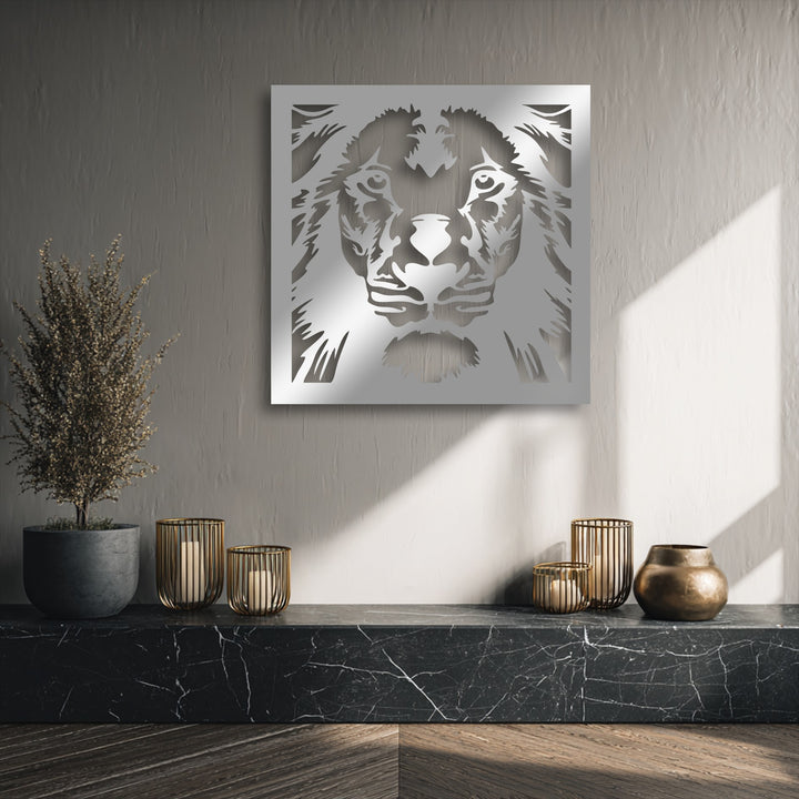 Majestic lion face, a unique metal wall art piece with intricate geometric details, reflects light on a textured wall.