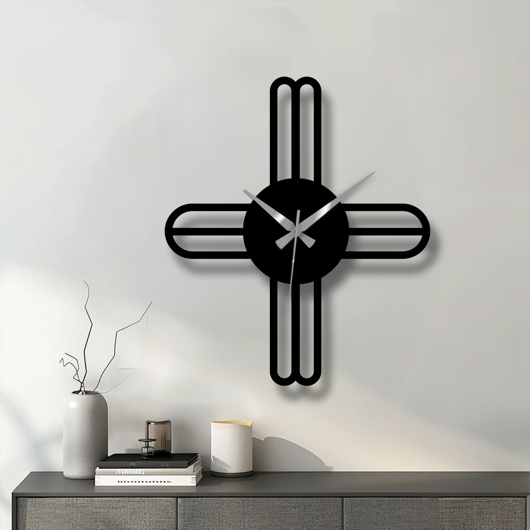 Subdued saturation enhances the minimalist design of this modern cross line metal wall clock, showcasing unique modern wall decor for a sophisticated look.