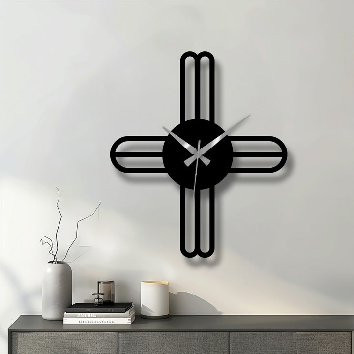 Subdued saturation enhances the minimalist design of this modern cross line metal wall clock, showcasing unique modern wall decor for a sophisticated look.