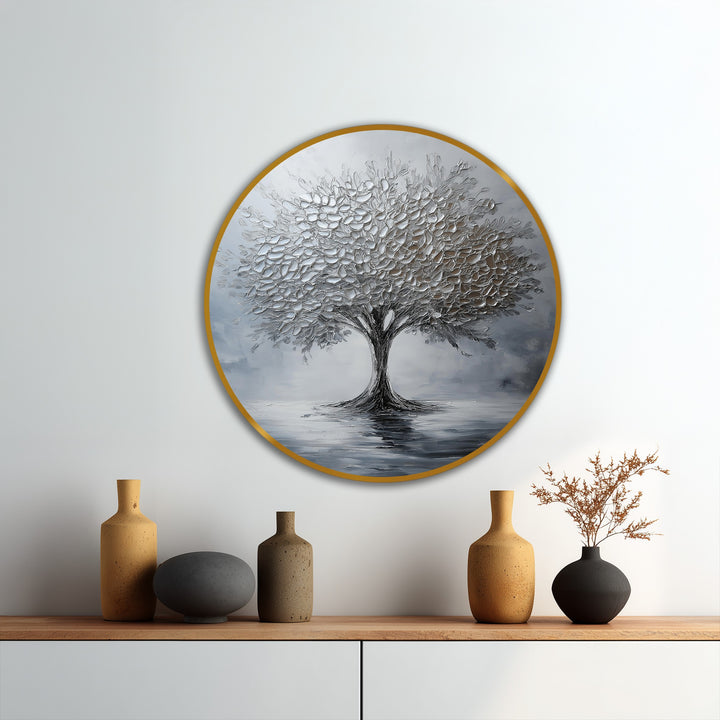 Arrangement of vases on a wooden shelf below the round modern oil painting art showcases decorative accents in front of the tree reflection artwork.