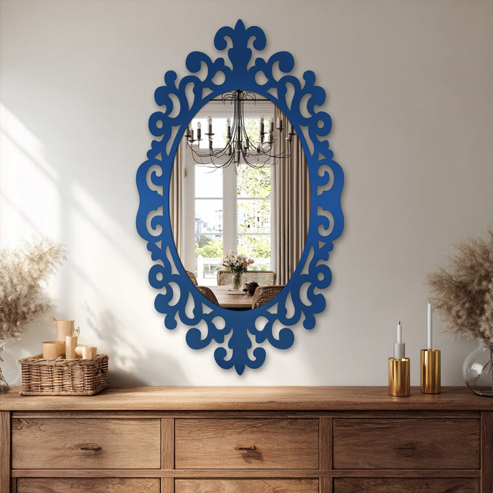 Royal blue modern wall mirrors accentuate the color transition from the off-white wall to the interior decor reflected in the Imperial Scroll accent oval frame.
