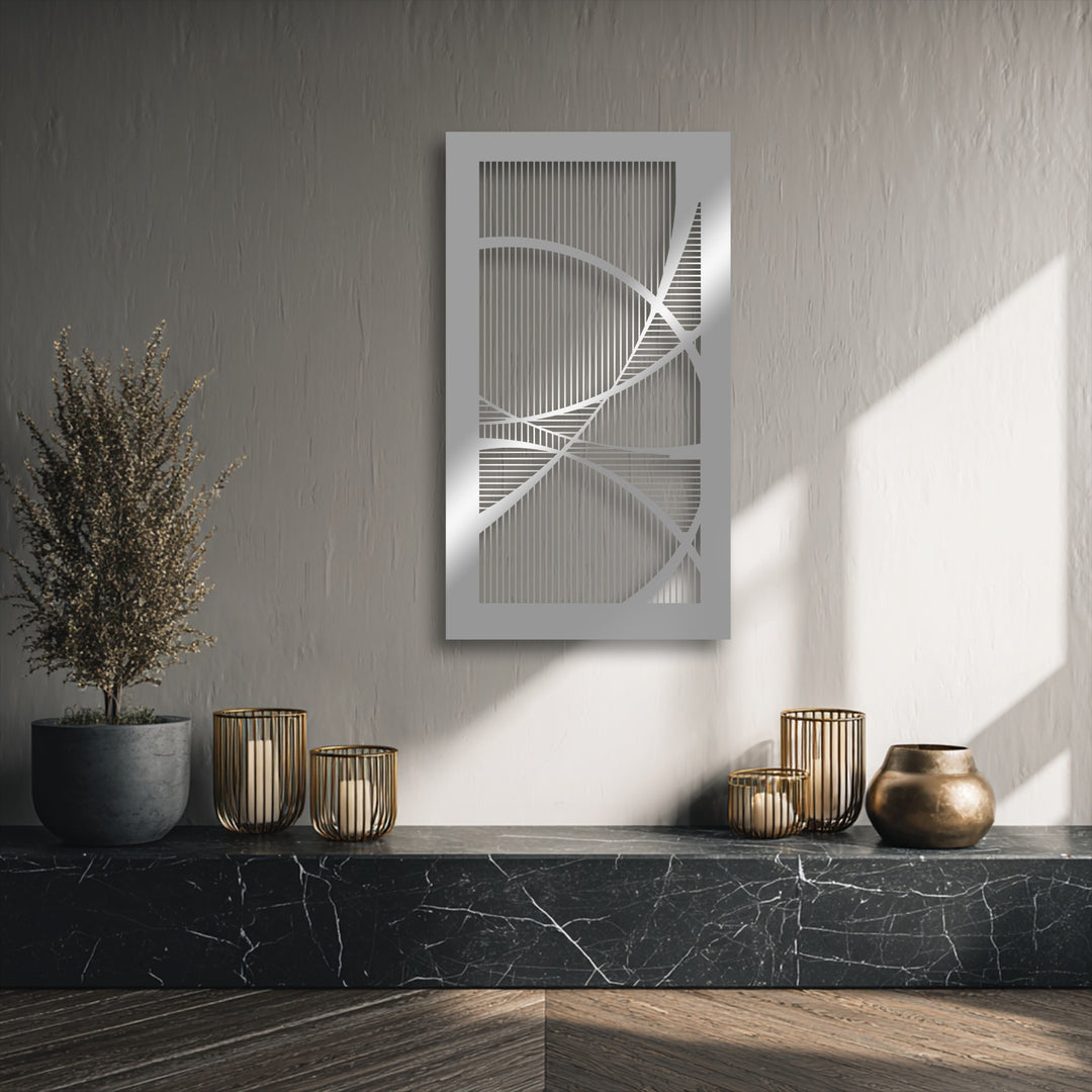 The serene and modern mood of a room is enhanced by a geometric unique metal wall art piece, complemented by warm metallic accents and natural light.