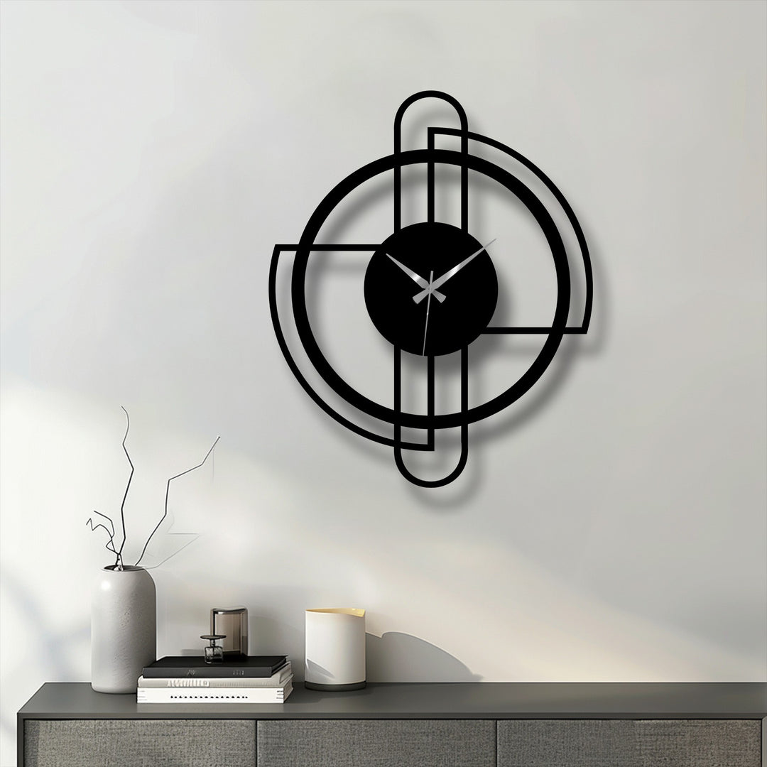 Geometric black decoration wall art is the focal point of this modern metal wall clock, drawing attention with its minimalist line design and circular frame.