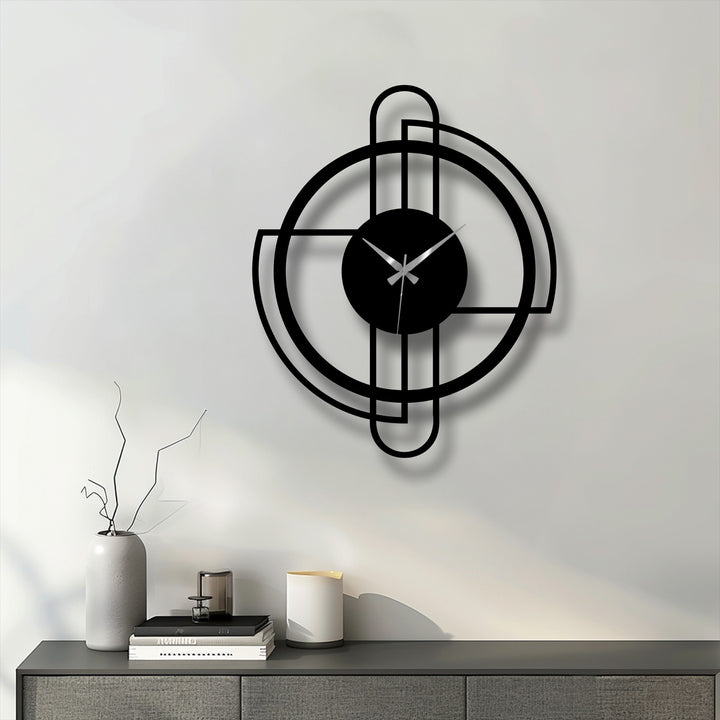 Geometric black decoration wall art is the focal point of this modern metal wall clock, drawing attention with its minimalist line design and circular frame.