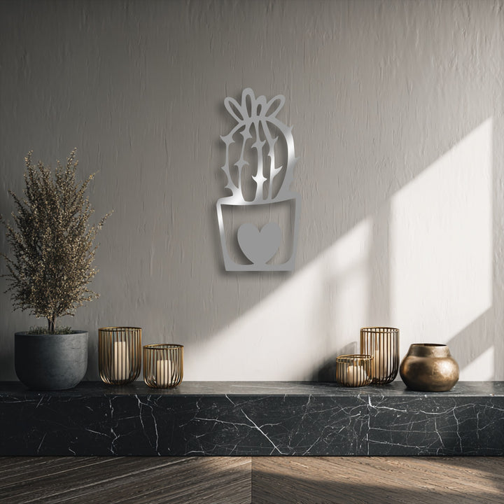 The darkest area, a polished black marble console and deep-toned wooden floor, grounds the elegant cute cactus metal decoration wall art.