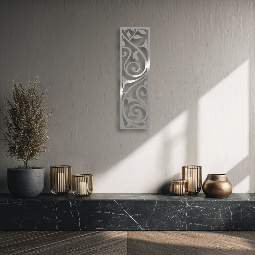 The delicate, feathery texture of a dried plant subtly complements the elegant scroll vine panel metal decoration wall art.