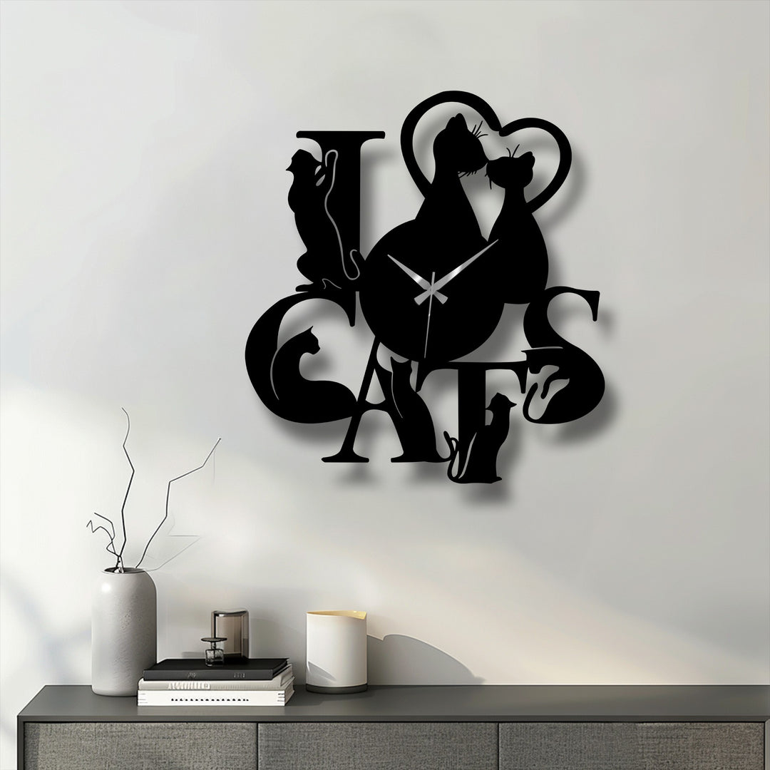 The brightest area showcases a sleek 'Love Cats' metal art for wall clock with cat silhouettes casting subtle shadows against a pristine white background.