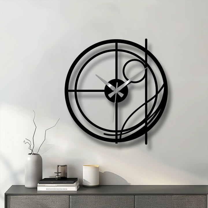 Defined by the transition between colors, this modern abstract metal wall clock shows the interplay of light and shadow across its circular metal artwork design.