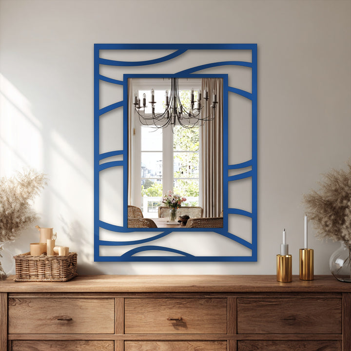 The realistic detail of the abstract wave frame on this modern fluid line design emphasizes the intricacy of the stained glass wall mirror.