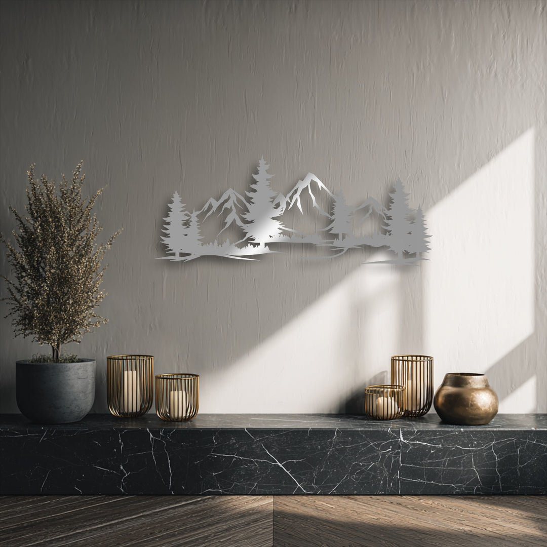 Diagonal light and shadow dramatically accentuate the Evergreen Peaks metal wall decor, revealing its intricate pine trees and scenic peaks.
