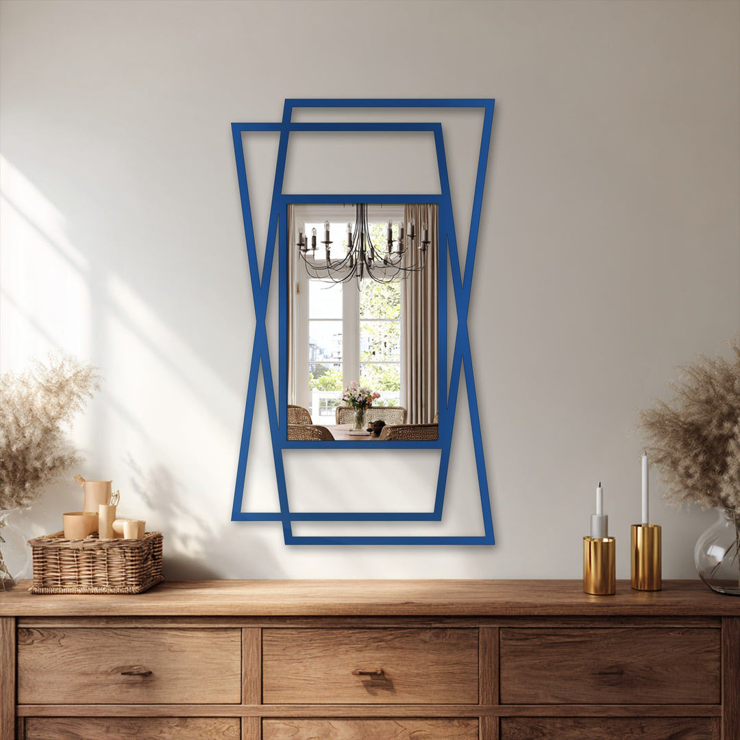 Reflected in this angular, geometric bathroom mirror, the softest element is the warm glow of daylight illuminating the dining room beyond.