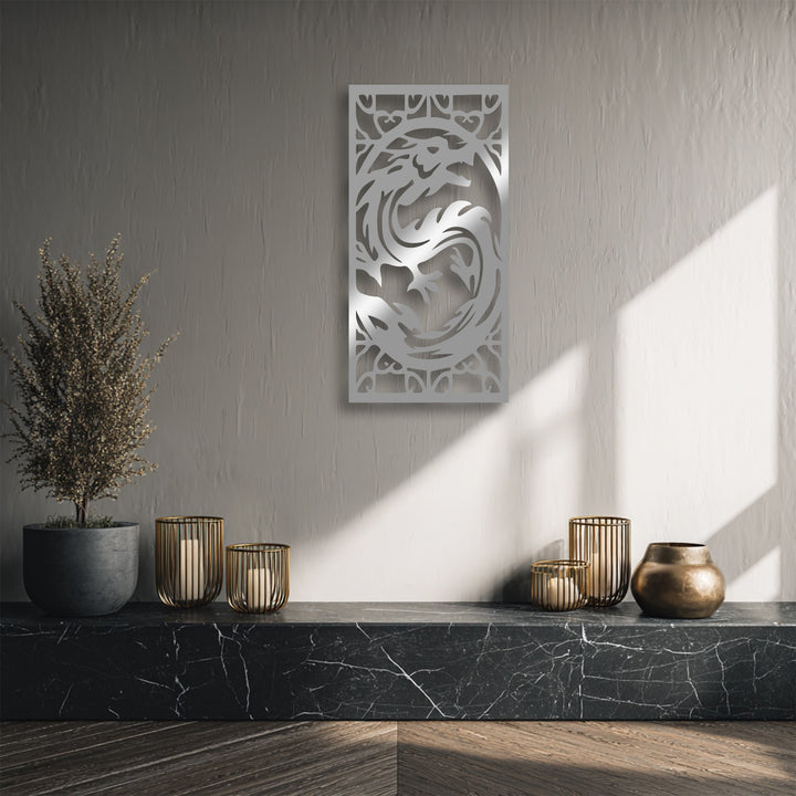 The foreground features a black marble shelf, golden candle holders, and a bronze pot, complementing the mythical creature metal artwork.