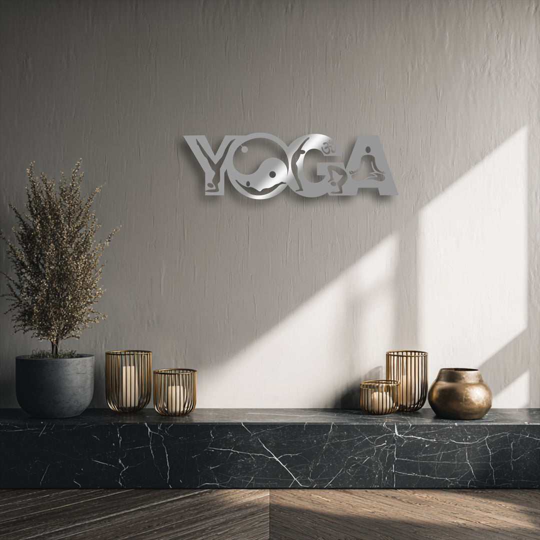Striking silver Yoga Balance Flow metal wall decor powerfully contrasts against the textured muted grey wall, highlighted by dark marble below.