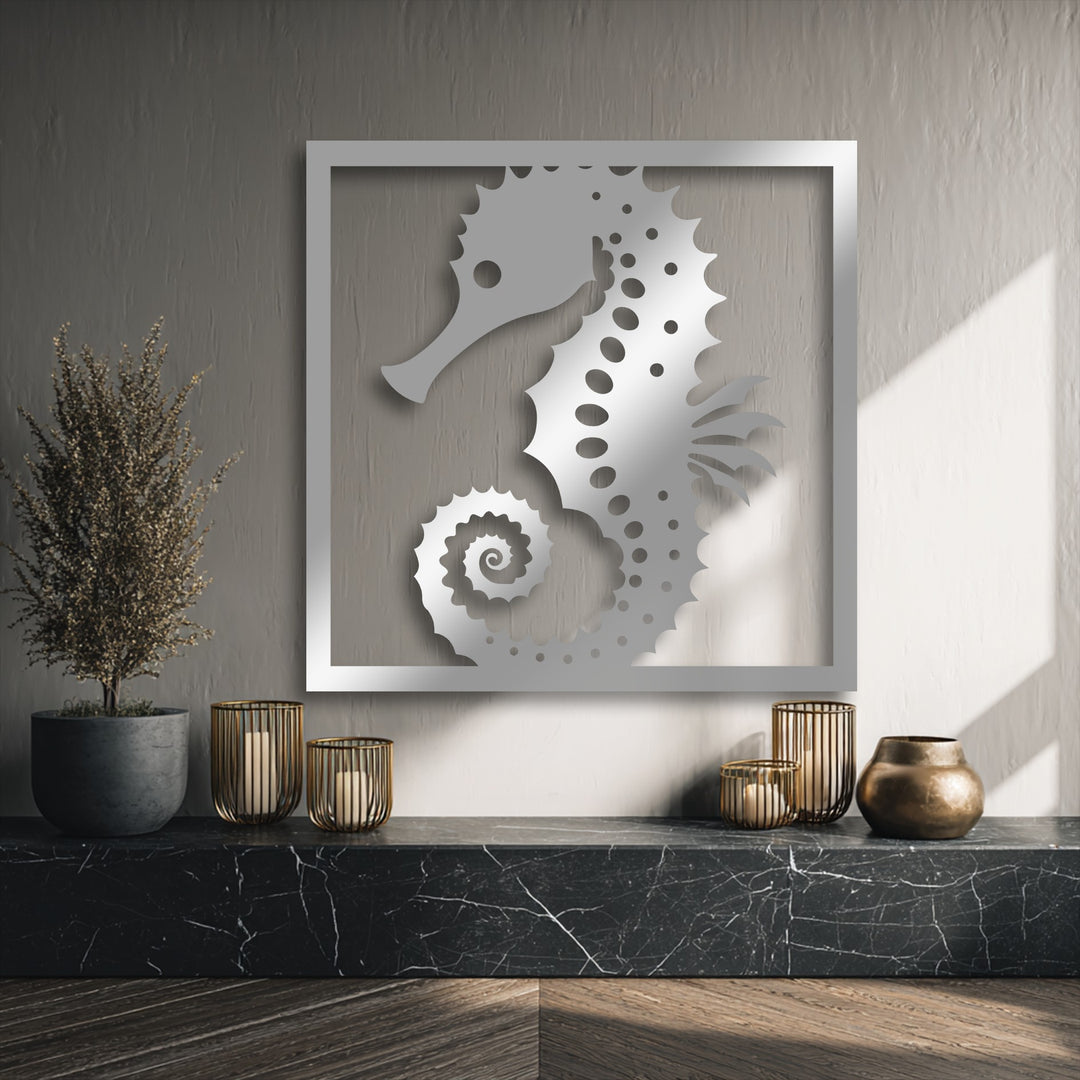 Oriented vertically, the intricate seahorse decorative metal art is presented within a sleek rectangular frame, highlighting its elegant shape.