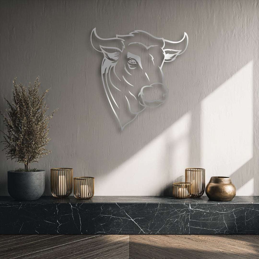 With its understated color saturation, this unique metal wall art showcases a minimal line rustic bull head in a contemporary setting.