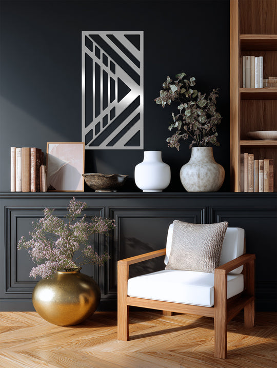 Vertical rectangular metal art for wall featuring a dynamic flow of modern abstract geometric lines with a silver finish.