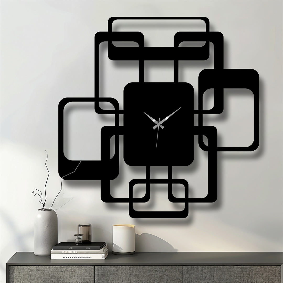 Subtle shadows gently accentuating the unique metal wall art clock's geometric design and interlocking squares give the modern time piece depth.