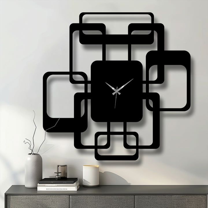 Subtle shadows gently accentuating the unique metal wall art clock's geometric design and interlocking squares give the modern time piece depth.