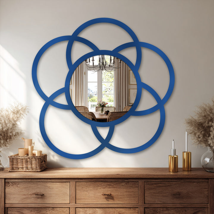 Finished in vibrant blue, this interlocking circle floor mirror presents a modern mirror framed in a geometric design, perfect as decorative metal artwork.