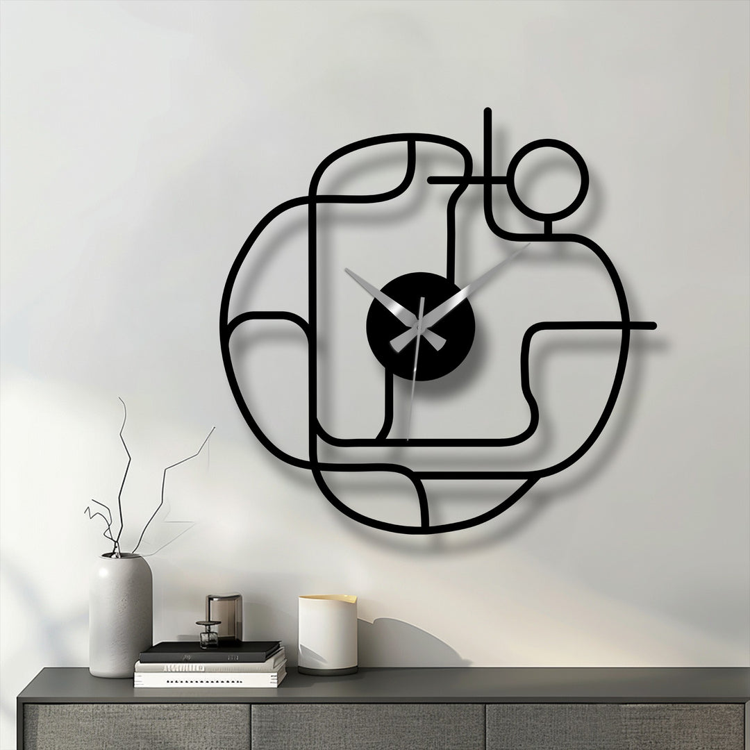 Highlighting the darkest area, this image showcases a modern abstract line metal wall clock, presenting unique metal art for wall in a minimalist, contemporary style.